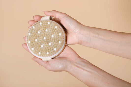 HADAKA MASSĀJI CELLULITE AND DETOX BRUSH & WONDER LUXE MARULA BODY OIL.