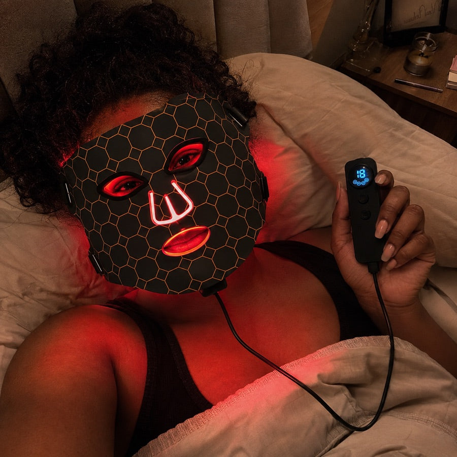Woman using the LED FLEX Mask during a red light evening ritual
